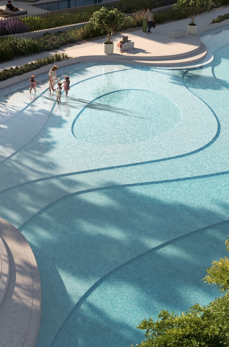 Aerial view of The Oasis community with water canals by Le MAS Real Estate